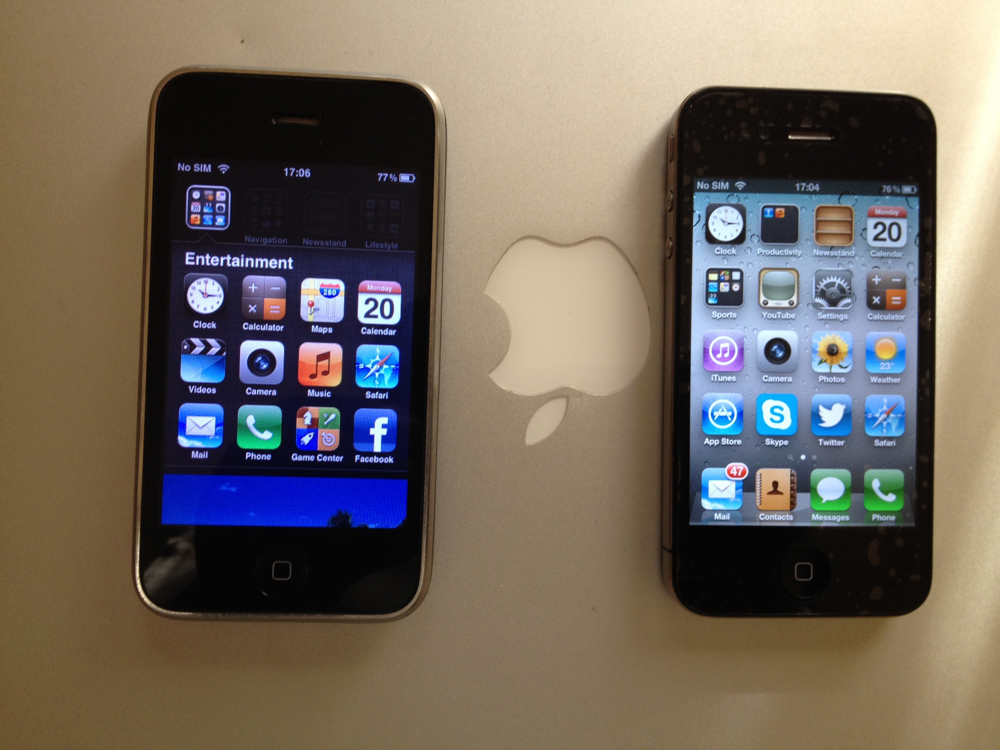 used iPhone 4S to take image of iPhone 4 on the right and iPhone 3GS ...